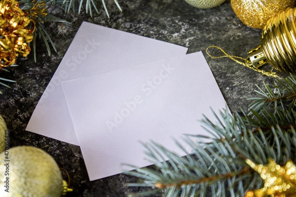 Fototapeta Blank christmas card on table and christmas decorations. Space for text
