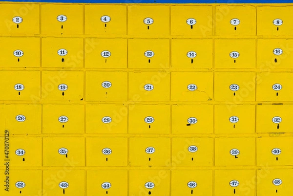 Obraz Yellow post boxes for residential buildings