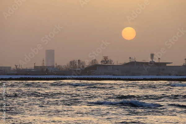 Obraz 黄砂の中に沈む夕陽