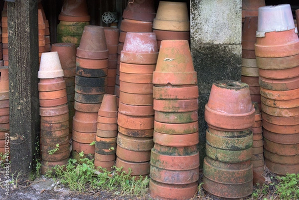 Fototapeta Stack of terracotta pots