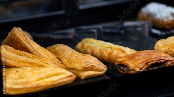 Fototapeta Delicious treats and snacks for breakfast in a coffee shop display
