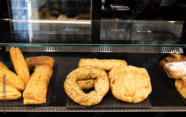 Fototapeta Delicious treats and snacks for breakfast in a coffee shop display