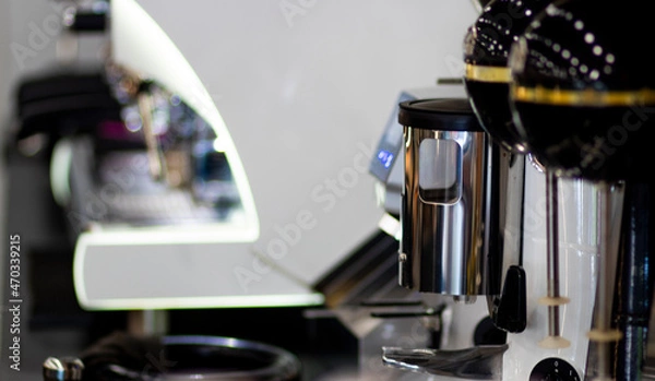 Fototapeta Espresso coffee beans and coffee grinder in a small coffee shop