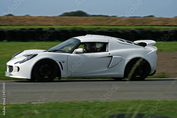 Obraz white sportscar on the track