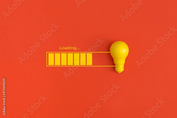Fototapeta Light bulb and loading on red background. Inspiration and creative idea concept.