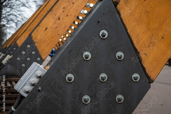 Obraz Elements of metal fasteners on wooden supports