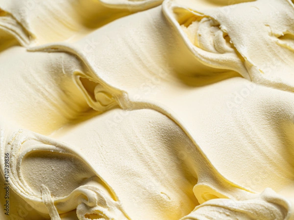 Fototapeta Vanila flavour gelato - full frame detail. Close up of a beige surface texture of vanilla Ice cream.