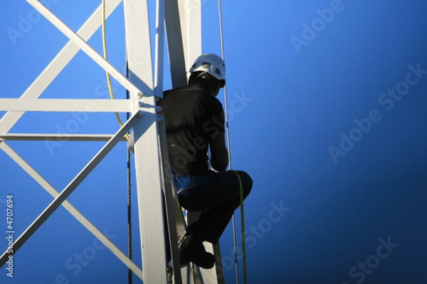 Fototapeta Arbeiter in schwindelnder Höh