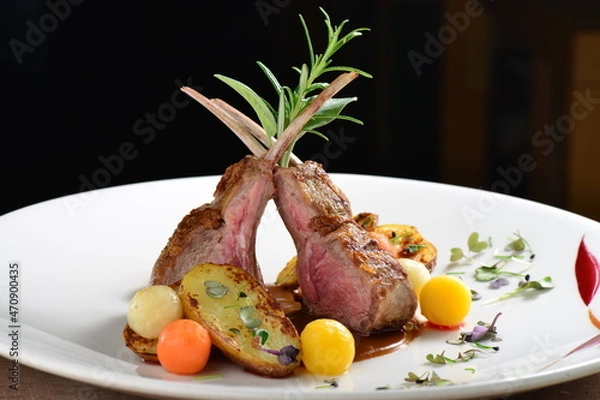 Fototapeta Fine dining, roasted Lamb chops with potato, rosemary and vegetable sauce