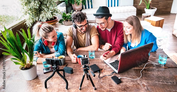 Fototapeta Milenial people sharing content on streaming platform with digital web camera - Modern lifestyle concept with smart millenial guys and girls having fun vlogging live feeds on social media networks
