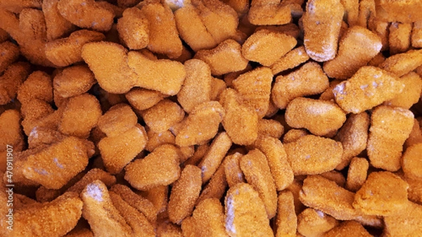 Obraz Stack Raw Frozen Chicken Nuggets. Several Chicken Nuggets In Breading Close-Up