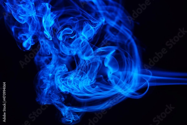 Fototapeta Abstract colored smoke hookah on dark background. Texture. Art Design element. Personal vaporizers fragrant steam. Concept of alternative non-nicotine smoking. E-cigarette. Blurry image, soft focus