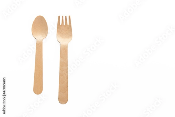 Fototapeta wooden spoon and folks isolated on the white background ready to cook and taste with the ingredients of your choice. Place for text. Copy space