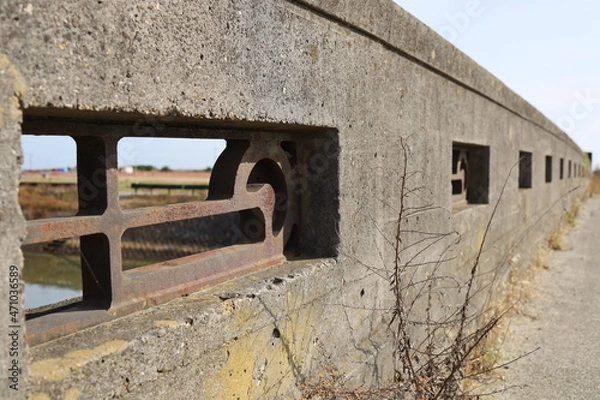 Fototapeta Sendai City, Miyagi Prefecture Japan, November 2021. Earthquake remains Arahama Elementary School
.. The current state of the Sadayama Canal.　A bridge that was not damaged by the tsunami
