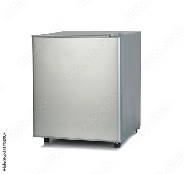 Fototapeta Small metallic grey color refrigerator isolated on white background