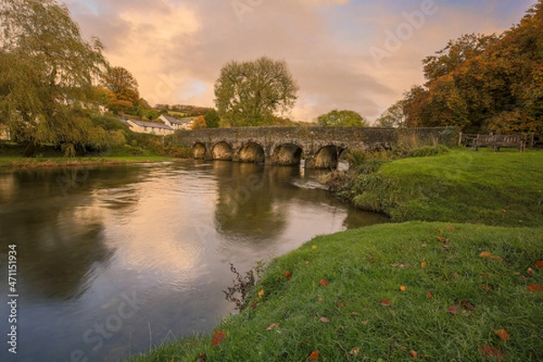 Fototapeta Sunset over a stone bridge in Devon, England