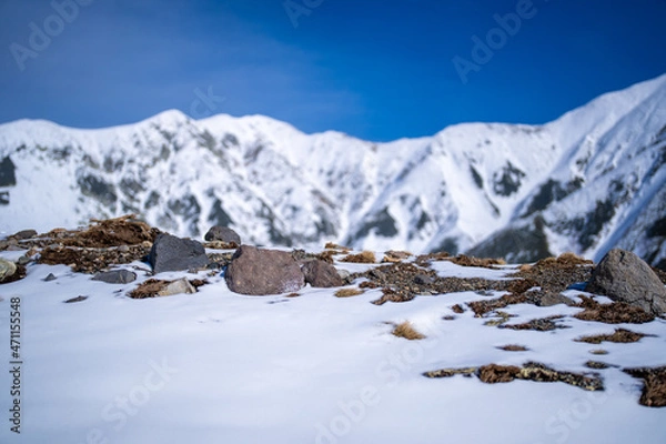 Obraz 富山県立山町にある立山の冬の雪景色のある風景 Landscape with snowy winter scenery of Tateyama in Tateyama Town, Toyama Prefecture, Japan.