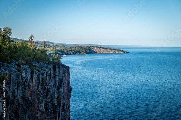 Obraz Beautiful landscape along the north shore of Lake Superior in Minnesota, from Palisade Head, a natural sheer cliff at the edge of the blue water. Evening image at the shore of Gitchi-Gami.