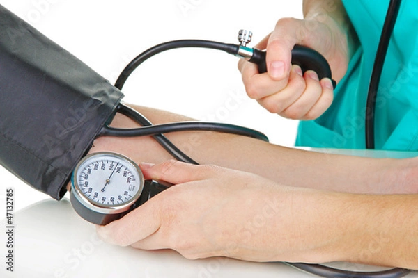 Fototapeta Blood pressure measuring isolated on white