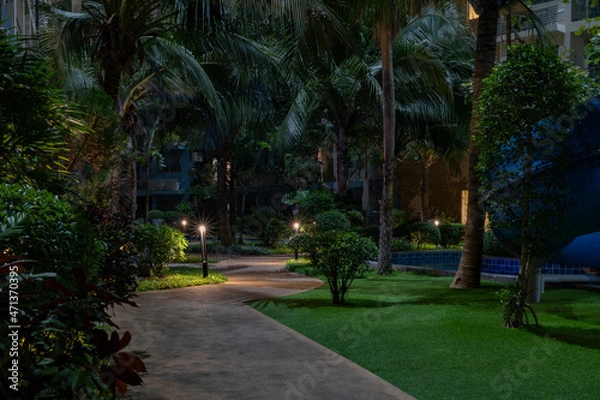 Fototapeta A winding path with night lighting.