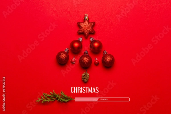 Fototapeta Composition with the design of Christmas loading on a red background