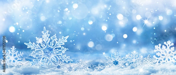 Fototapeta Snowflakes On Snow - Christmas And Winter Background - Natural Snowdrift Close Up With Abstract Light