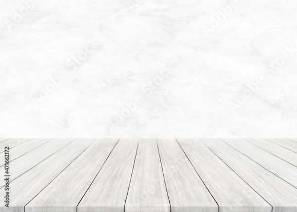 Fototapeta Empty white wood table top and blur wall. Wall Texture Background. Building banner mock up abstract background - can used for display or montage your products.
