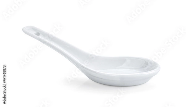 Fototapeta ceramic spoon isolated on white background