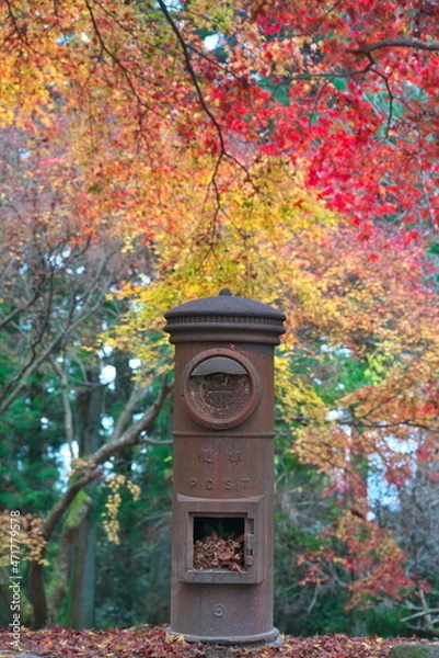 Fototapeta Hyogo,Japan- November 23, 2021: An obsolete rusty mailbox in autumn  

