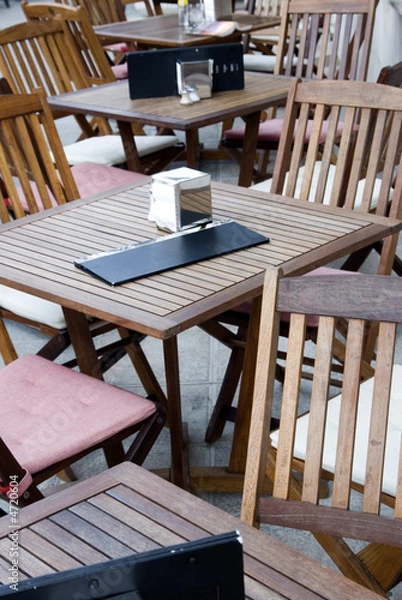 Obraz cafe tables and chairs outside