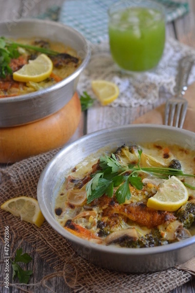 Fototapeta Chicken breasts with sour cream, broccoli and carrots