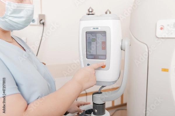 Fototapeta Medical CT or MRI Scan in the modern hospital laboratory. Interior of radiography department. Technologically advanced equipment in white room. Magnetic resonance diagnostics machine.