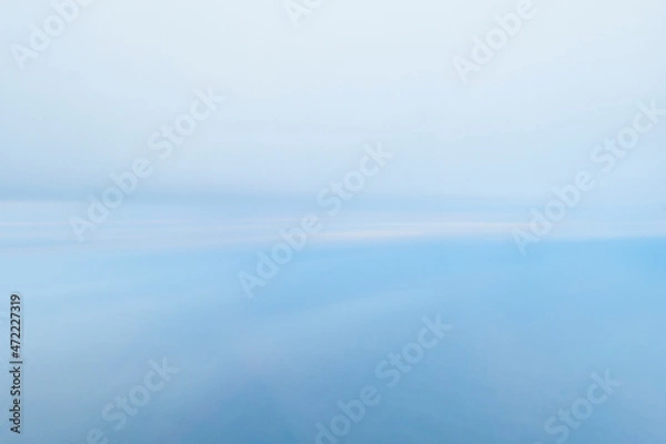 Obraz Soft blue background texture: blurred color gradient backdrop or wallpaper.