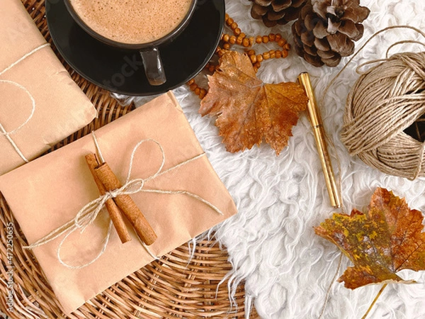Fototapeta Autumn decorations and gifts on table, background, mockup