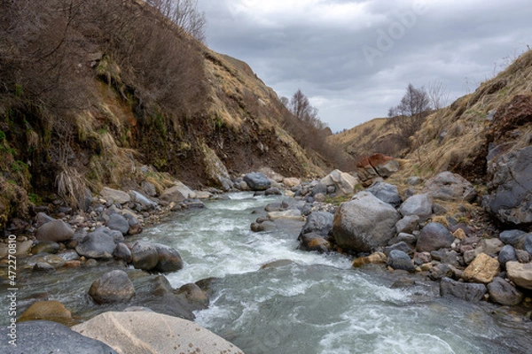 Fototapeta view of a winding mountain river
