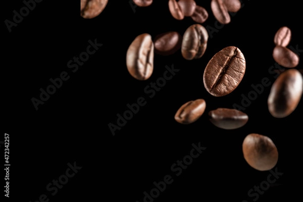 Obraz close up coffee beans on black background