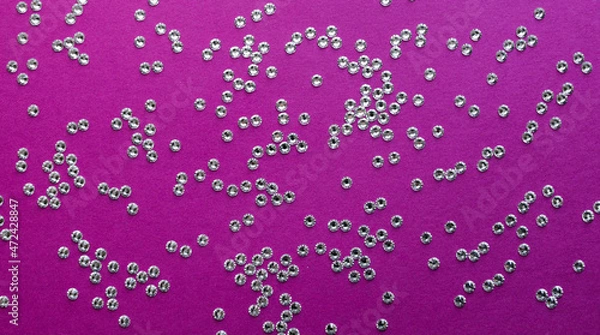 Obraz rhinestones on a purple background, top photo. design for text