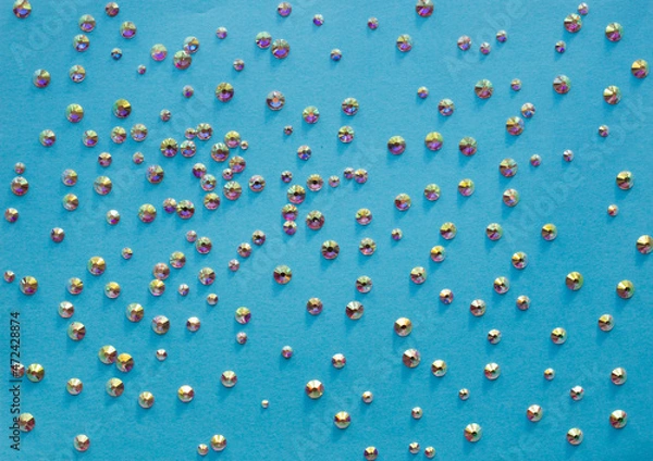 Obraz rhinestones on a blue background, top photo. design for text