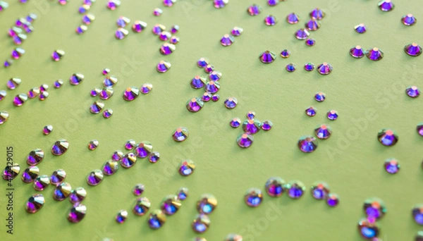 Obraz rhinestones on a green background,blure. design for text