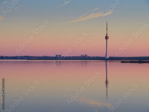 Fototapeta View with Techirghiol lake and Eforie city at sunset in Romania