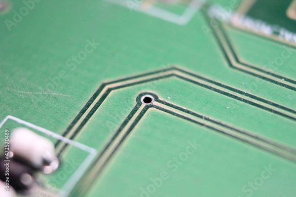 Fototapeta Electronic board with circuit lines and chip