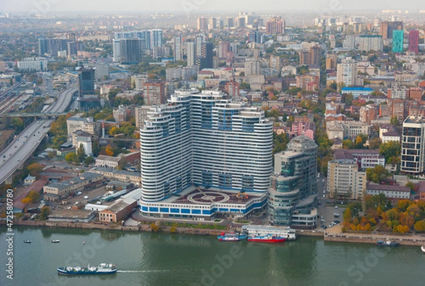 Fototapeta White Angel residential complex and Riverside-Don business center. View from the plane. Rostov-on-Don, October 18, 2021. 