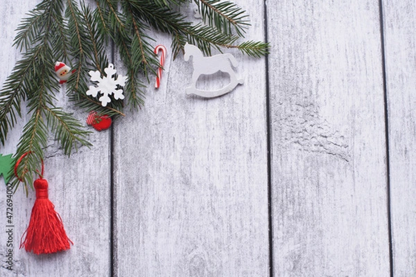 Fototapeta Caramel, fir branches, toys on a white photo background.
