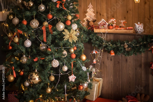 Fototapeta Christmas tree and wall with christmas decorations