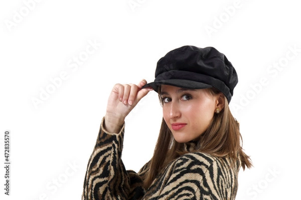 Obraz Stylish woman looking at the camera while posing over an isolated background.