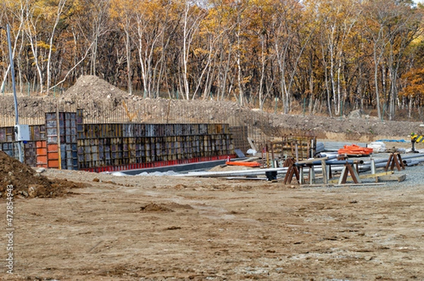 Obraz Construction site in a wooded area.