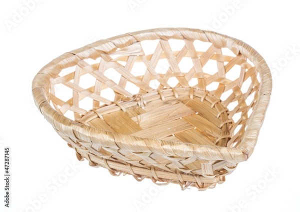 Fototapeta Wickerwork empty yellow breadbasket on white background