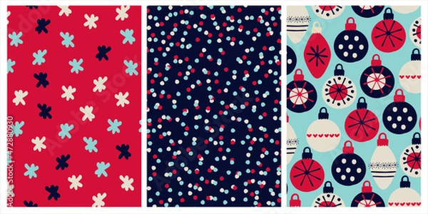 Fototapeta Set of seamless patterns for Christmas, New Year gifts wrapping paper. Festive vibrant backgrounds with snowflakes, confetti, bauble ornaments