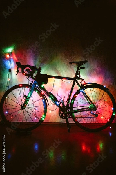 Fototapeta Bicycle decorated with Christmas lights