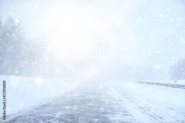 Fototapeta winter highway snowfall background fog poor visibility